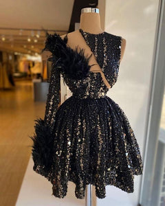 Black Homecoming Dress 2023 One-shoulder Sequin Long Sleeve with Feath AnnaCustomDress Black Homecoming Dress 2023 One-shoulder Sequin Long Sleeve with Feath AnnaCustomDress