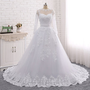 Ball Gown Wedding Dresses Jewel Neck Long Sleeve Chapel Train Tulle See-Through Romantic Elegant with Beading Appliques Bow(s） 2021