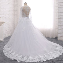 Load image into Gallery viewer, Ball Gown Wedding Dresses Jewel Neck Long Sleeve Chapel Train Tulle See-Through Romantic Elegant with Beading Appliques Bow(s） 2021